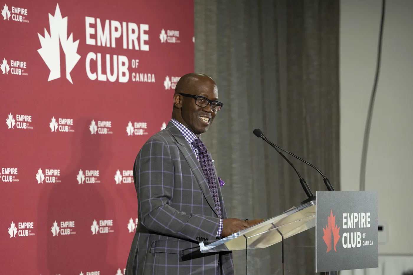 A speaker at the podium at Empire Nights 2026